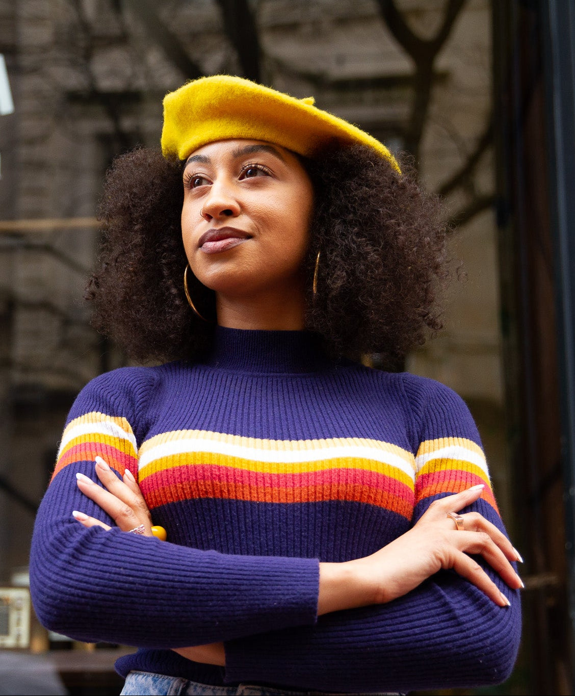 Rayven westpoint headshot in a yellow beret 