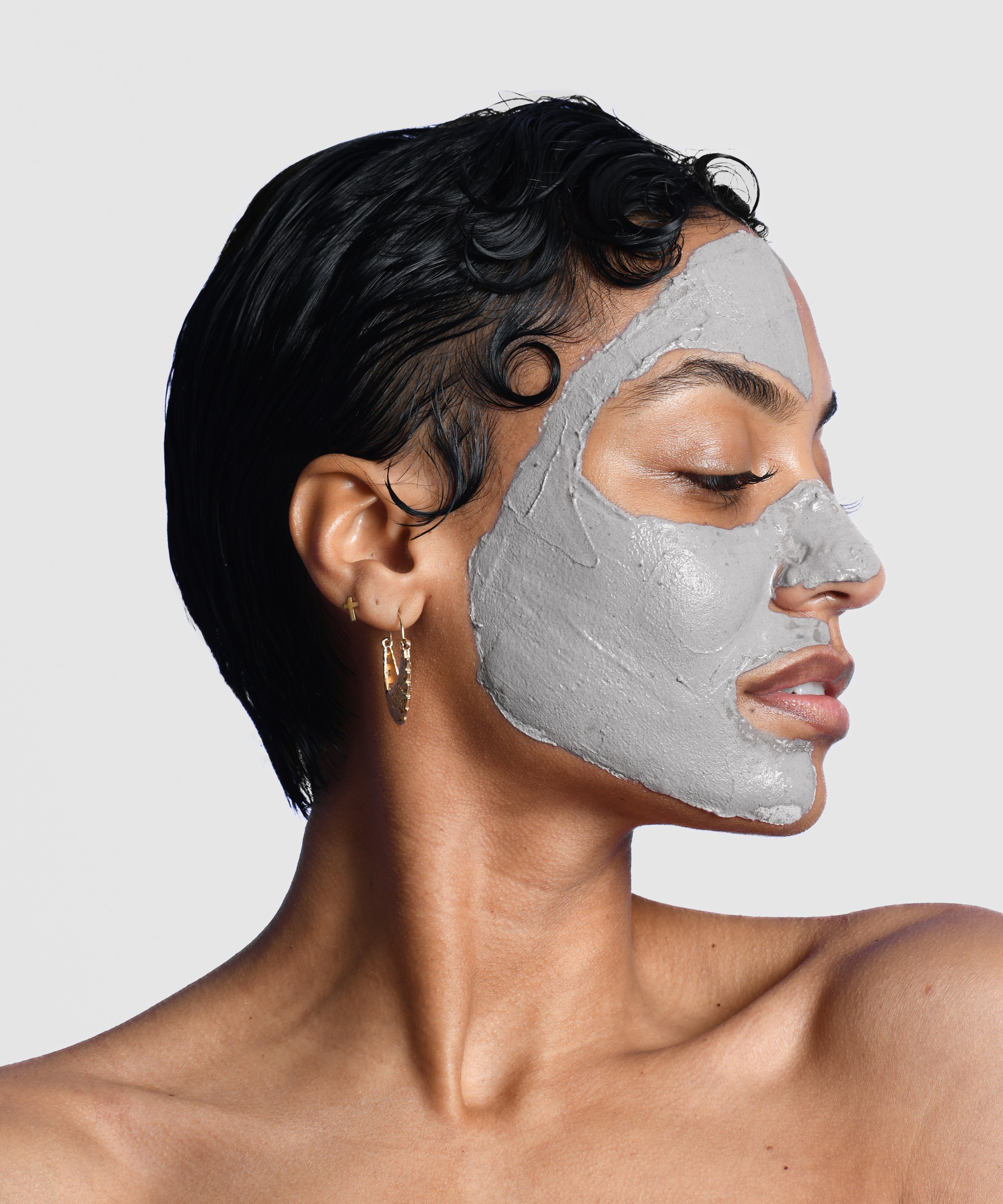 Skin care model with an activated charcoal mask facial on 