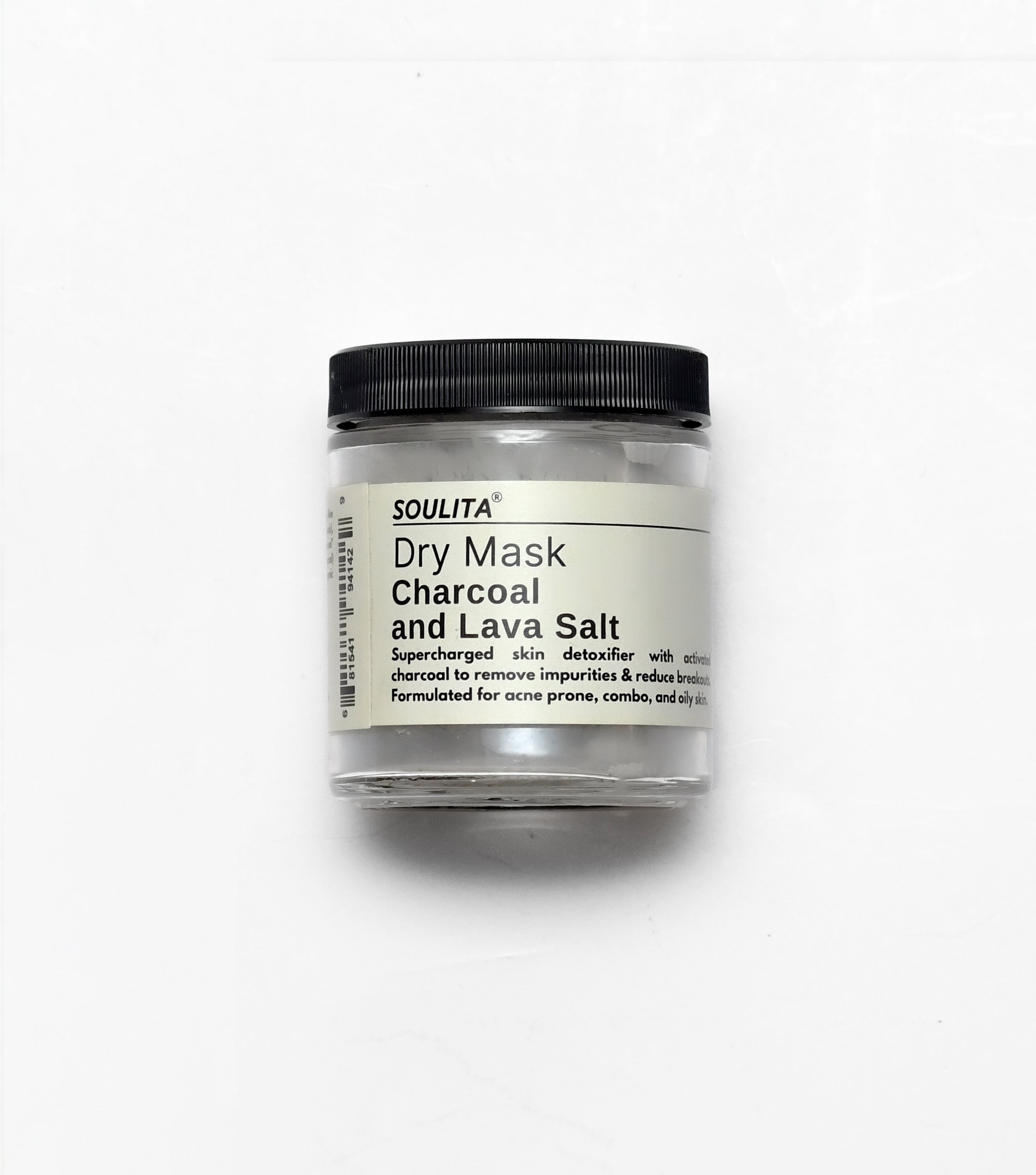 charcoal and lava salt dry mask facial product photo with a white background